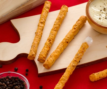 Grissini mit schwarzem Pfeffer Fondue