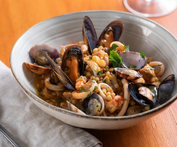 Fregola mit Meeresfrüchten