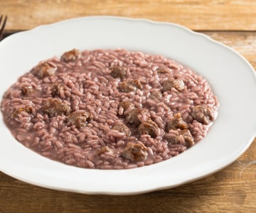 Risotto mit Rotwein und Wurst