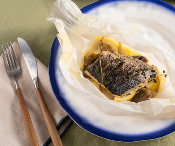 Wolfsbarsch in Folie