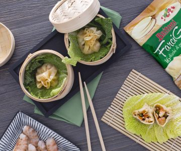 Gedämpfte Ravioli nach orientalischer Art mit Gemüse und Garnelen