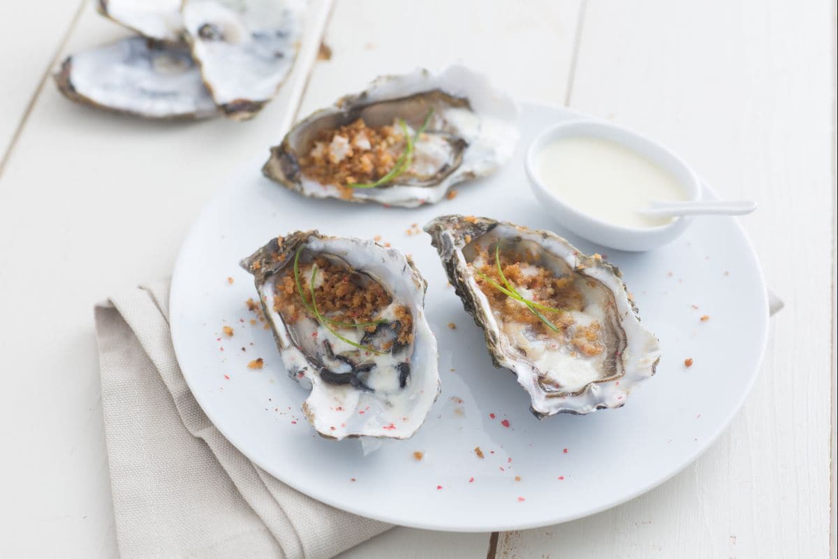 Austern mit Sekt und Frühlingszwiebel