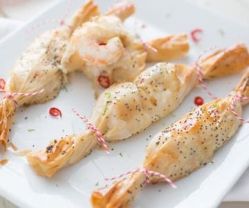 Weihnachtspäckchen mit Scampi, Ingwer und Limette