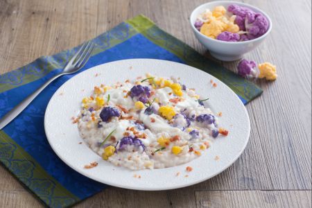 Risotto mit buntem Blumenkohl, Stracciatella und Guanciale