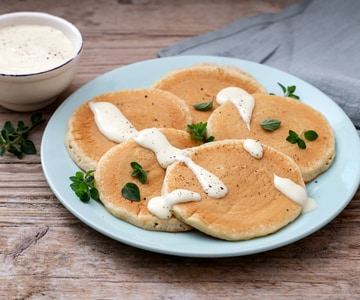Herzhafte Pfannkuchen mit Grana Padano DOP Sauce