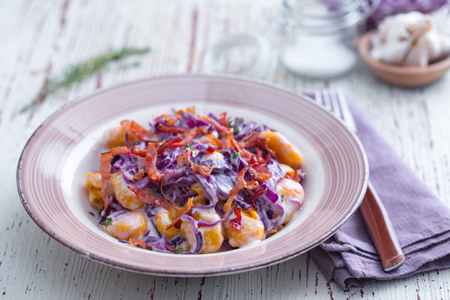 Kürbisgnocchi mit Grana Padano, Rotkohl und Speck