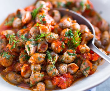 Meeresschnecken in Eintopf