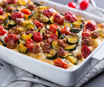 Lasagne mit Zucchini, confierten Tomaten und Wurst