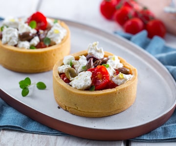 Herzhafte Törtchen mit Robiola