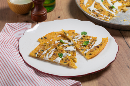 Farinata mit Zucchini und Pecorino-Fondue