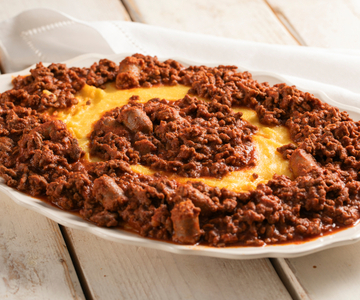 Polenta mit Bruscitt in Tomatensoße